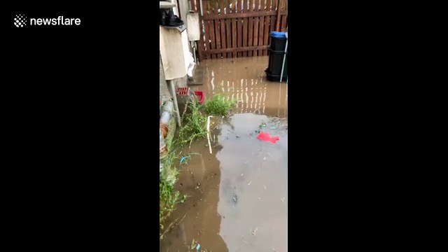 Resident shows extent of flooding in Scottish neighbourhood following heavy downpours
