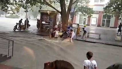 Falling and Floating in a Flooded Street