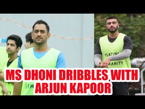 MS Dhoni dribbles with Arjun Kapoor