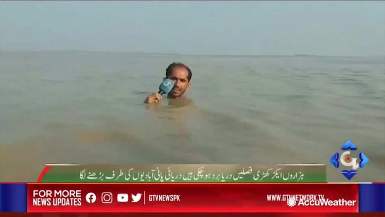 Pakistani reporter makes headlines himself after reporting in neck-deep flood waters