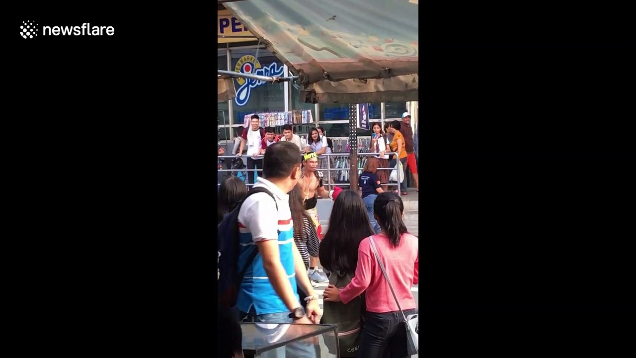 Balding Manny Pacquiao impersonator delights and confuses Philippines audience