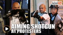 ENG TEXT - Cop points shotgun at protesters at close range in Hong Kong