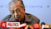 Mahathir vows to keep his promise to step down as PM, unless 'gun is put to his head'