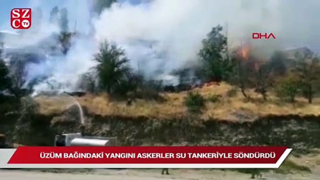 Üzüm bağındaki yangını askerler su tankeriyle söndürdü