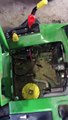 How to replace the battery on a John Deere SRX75 lawn mower