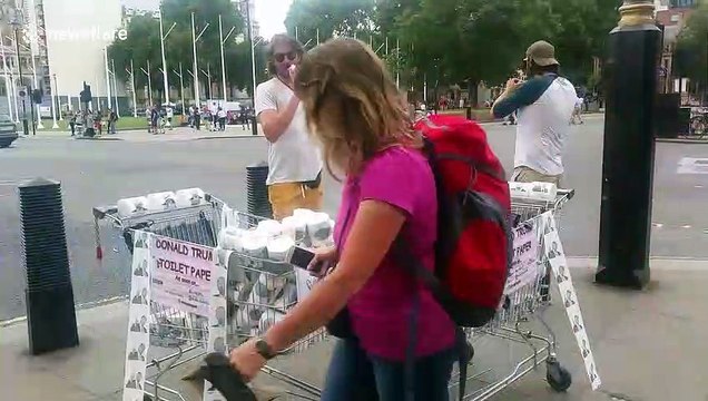 UK protestors sell Donald Trump patterned toilet paper in central London