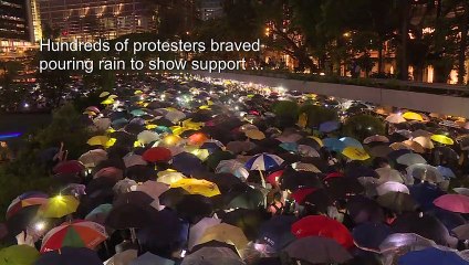 Hong Kong financial workers stage flash protest