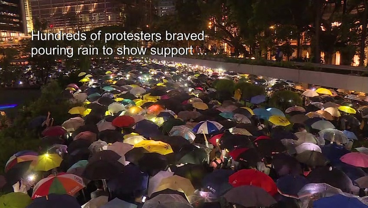 Hong Kong financial workers stage flash protest