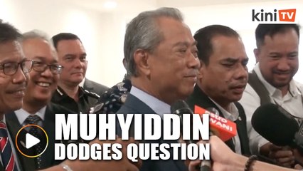 Muhyiddin walks away from question on opposition's backing for Dr M