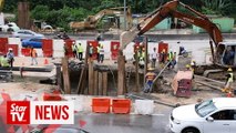Sinkhole caused by pipe burst; repair work continues at Federal Highway