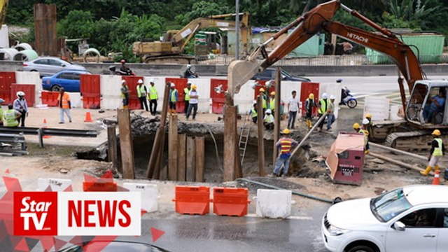 Sinkhole caused by pipe burst; repair work continues at Federal Highway