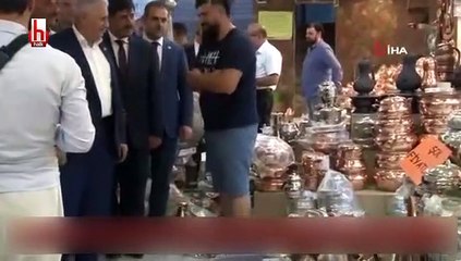 Binali Yıldırım, çatık kaşlı portresini görünce...