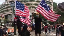 Protesters in Hong Kong seen waving US flags