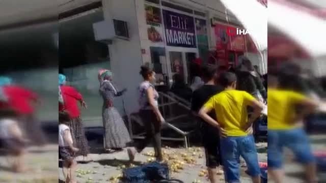 Cinayet zanlısına mahallelinin öfkesi... Öfkeli kalabalık zanlının iş yerini taşladı