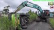 Dump Truck Tip Over Recovery by Kobelco SK200 Excavator | Tumbling Truck Evacuation