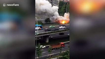Smoke pours out of van after it explodes on road in China's Chengdu