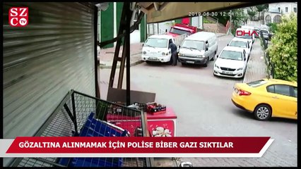 Tải video: Gözaltına alınmamak için polise biber gazı sıktılar