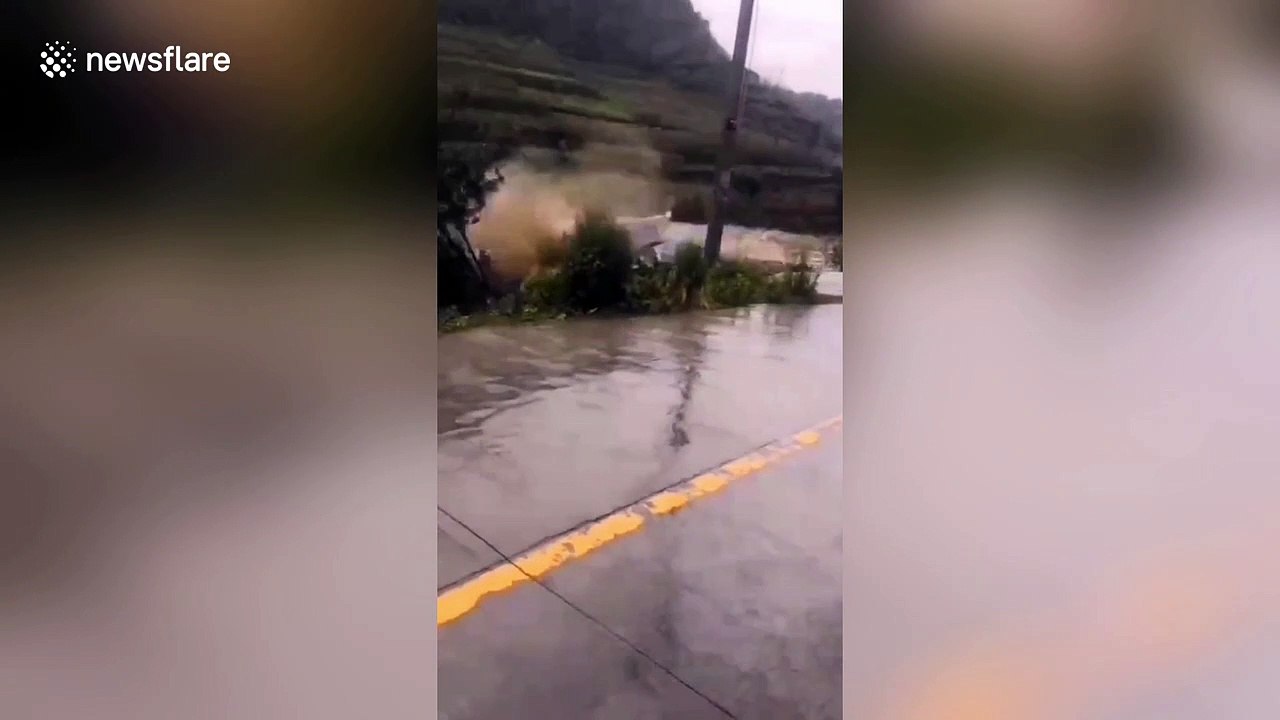 Several houses collapse as flash floods sweep northern China