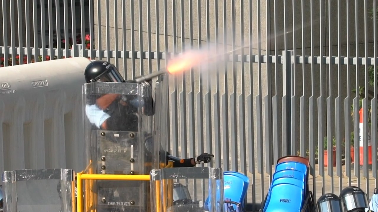 Hong Kong citywide strike turns violent as protesters seize control of major roads and clash with police in multiple locations
