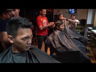 Business is good for Scottie Thompson's barber shop