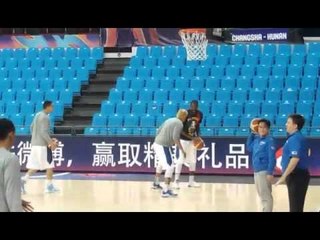 Coach Alex Compton helping out during warmups  before Gilas game vs India