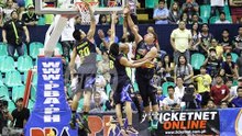 Globalport's Stanley Pringle stand tall over three RoS defenders