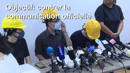 Hong Kong: des manifestants masqués devant la presse pour contrer la communication officielle