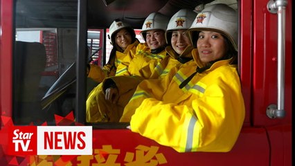 Women to the rescue in fire trucks