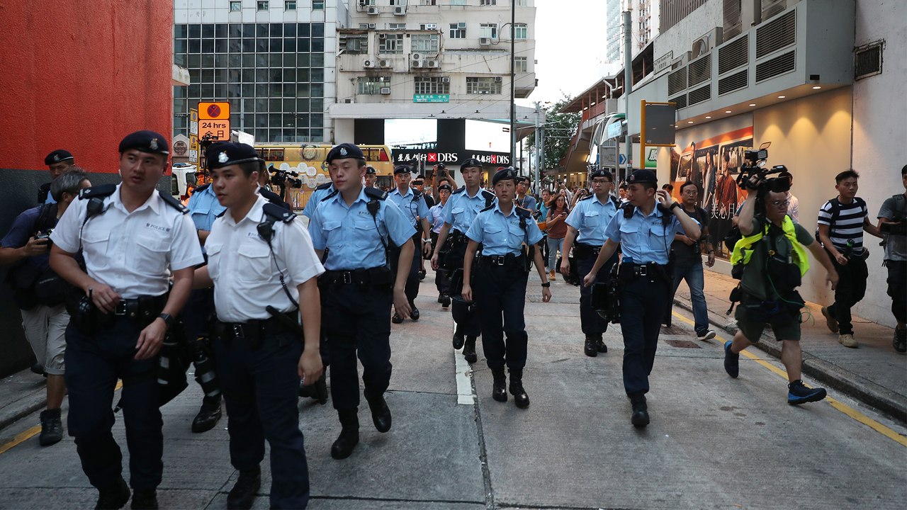 Fear remains in a residential district of Hong Kong, a day after clashes between extradition bill protesters and mobs armed with poles