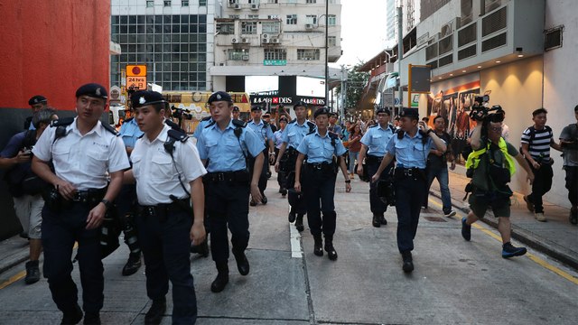Fear remains in a residential district of Hong Kong, a day after clashes between extradition bill protesters and mobs armed with poles