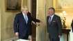 Boris Johnson greets Jordan's King Abdullah II