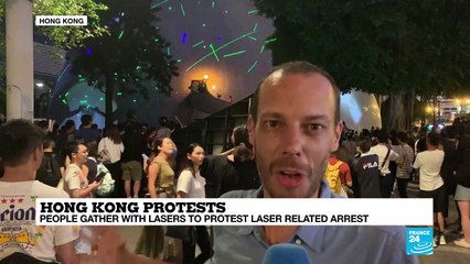 Hong Kong: people gather with lasers to protest laser-related arrest