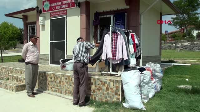 AKSARAY MUHTARDAN 'GİYMEDİĞİN ELBİSEYİ GETİR, İHTİYACIN VARSA BEDAVA GÖTÜR' KAMPANYASI