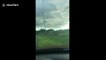 Bizarre funnel cloud appears over Florida highway