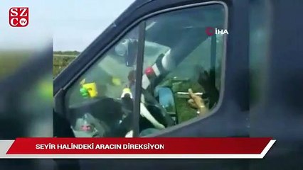 Download Video: Seyir halindeki aracın direksiyonunu bırakıp yemek yedi