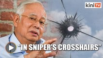 Najib shares photo of bullet hole at Pekan office 'from sniper'