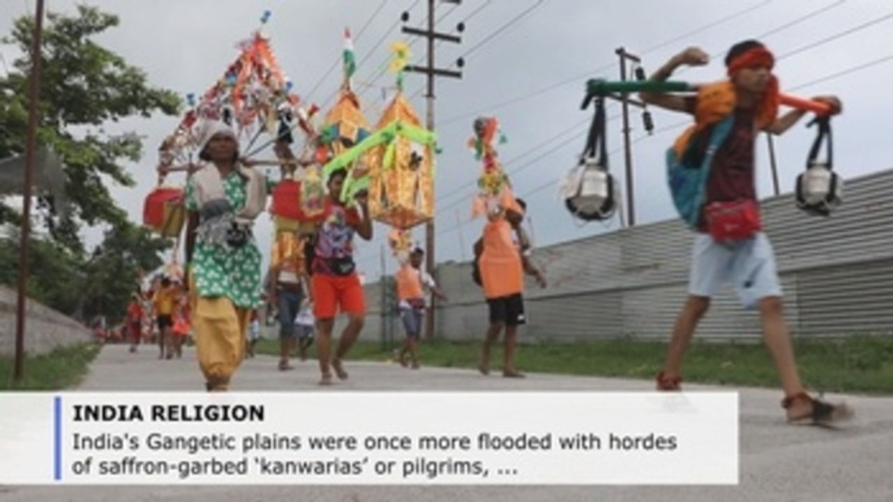 Saffron-clad, dope-using Indian pilgrims flood Ganges' plains to honor Shiva