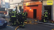 Los bomberos extinguen un aparatoso incendio en un taller de Usera
