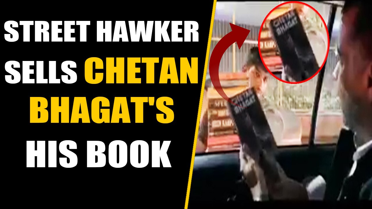 Chetan Bhagat gets pirated version of his book from a street hawker, video viral | Oneindia News