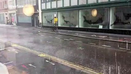 Heavy rain takes over the streets of London
