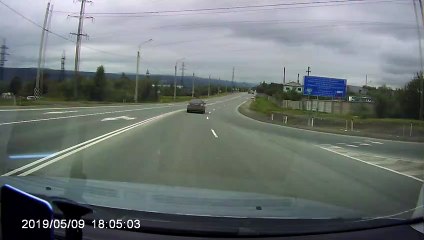 Car Pushed into Oncoming Traffic