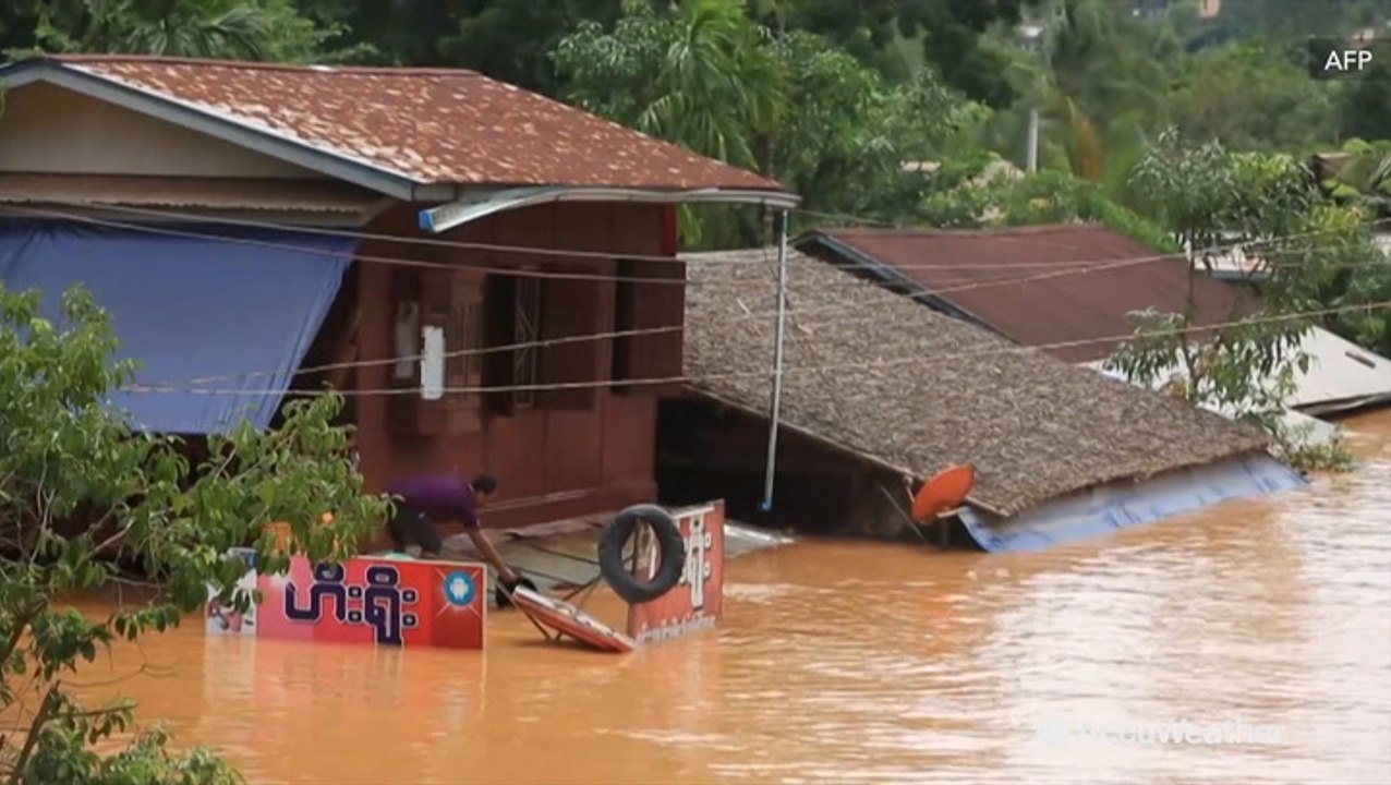 Residents swim, canoe through streets as monsoo...