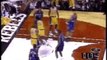 NBA BASKET BALL - Kobe Bryant Climbs on Ben Wallace