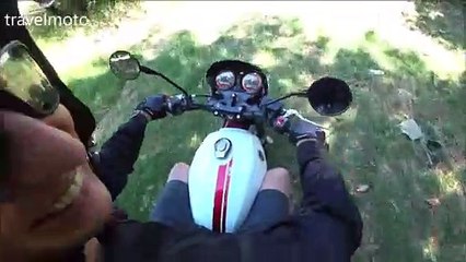 riding on the street the SYM WOLF 300cc cafe racer motorcycle