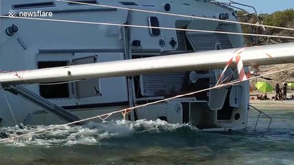 Shipwrecked yacht winds up on Ibiza beach with ecology message