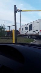 Camper Trailer Takes out Roof in Drive-Thru
