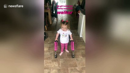 Little girl takes first steps after being told she could never walk