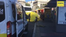 Muere una motorista arrollada por un autocar en la plaza de Cibeles