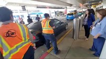 Heartwarming and intense moment runaway dog at Los Angeles airport rescued underneath car
