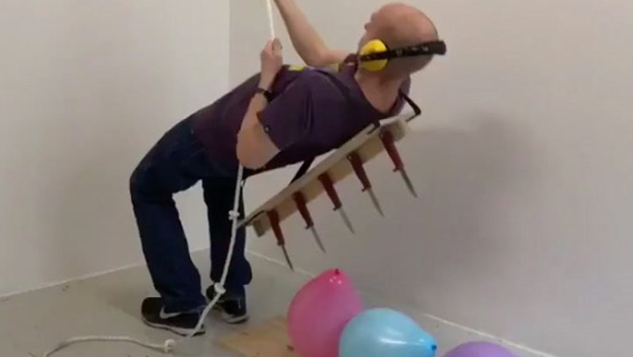 How Many Unusual Ways Can This Visual Artist Pop Balloons?